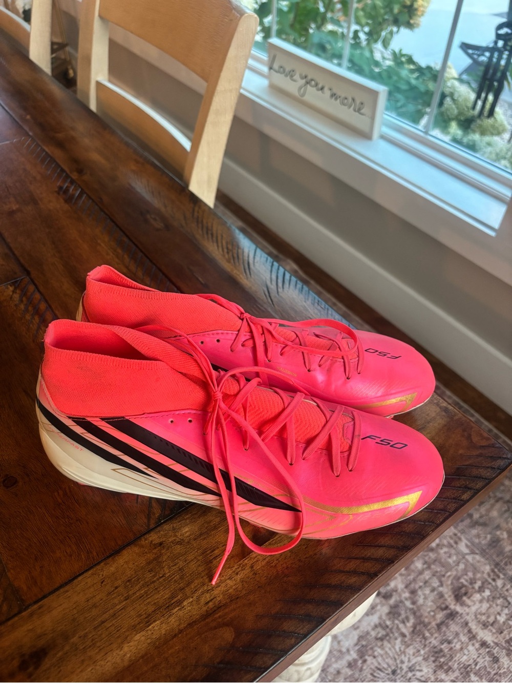 adidas Pink Athletic Soccer Cleats with Black Stripes